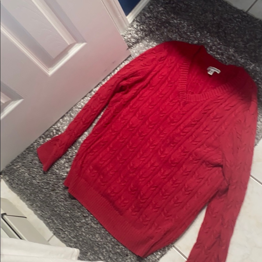 Red cable knit sweater